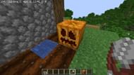 Using shears to carve a pumpkin (Image via Minecraft)